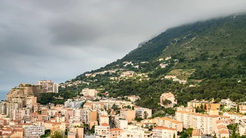 Time-lapse clouds on Monaco hills Stock Footage 129383705