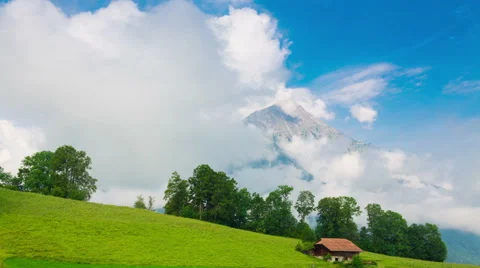 Time lapse clouds in motion covered mountain Video stock 44837336