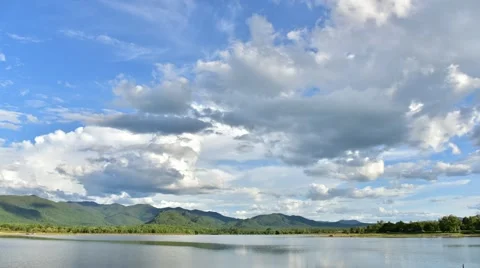 Time lapse of clouds with mountain and lake Video stock 51540329