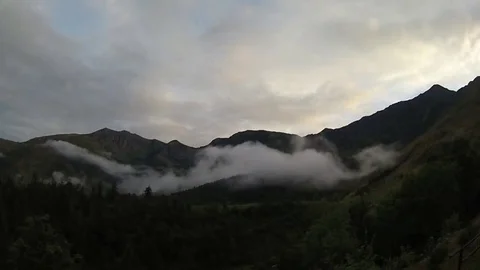Time lapse clouds in the mountains Video stock 69141571