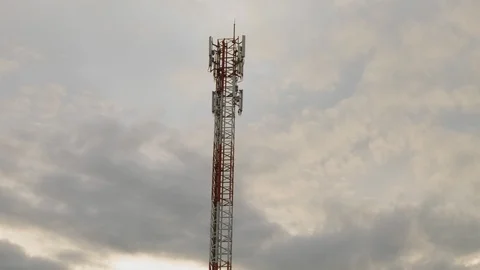 Time Lapse clouds move past a transmitter or antenna tower. Stock Footage 85589105