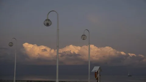 Time lapse of the clouds movement on the sky and boats on the sea. Video stock 110871113