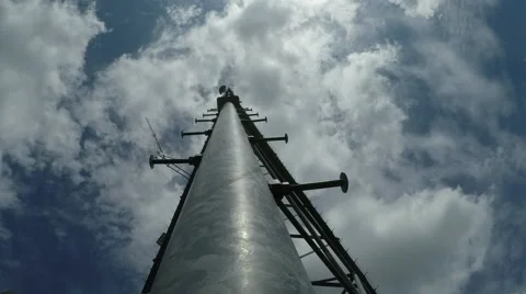 Time Lapse of Clouds Moving above Communications Microwave Tower Video stock 58972025