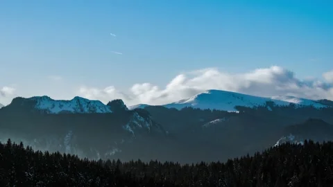 Time lapse of clouds moving above the Carpathian Mountains Stock Footage 233033174