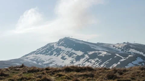 Time lapse of clouds moving above a mountain hill with funicular Stock-Footage 241744227