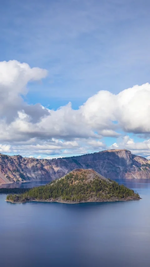 Time lapse of clouds moving above Crater Lake in Oregon. Vertical video. Stock Footage 335025772