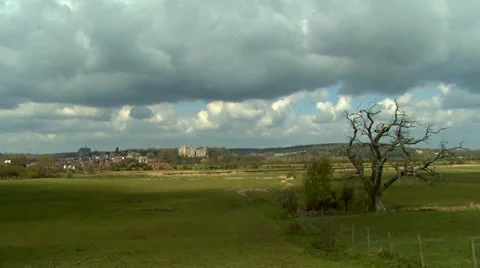 Time lapse of clouds moving across the sky above English countryside landscape Stock Footage 32961380