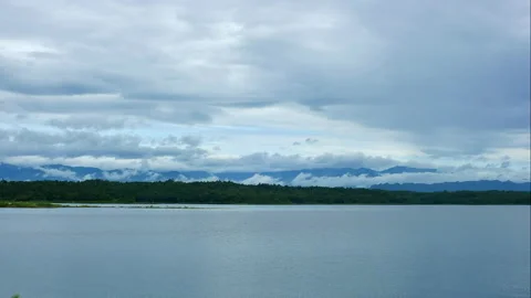 Time Lapse of the clouds moving across the sky above Stock Footage 202113210
