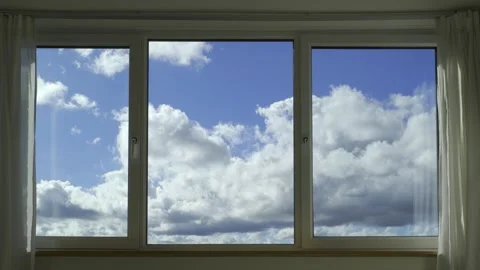 Time-Lapse Clouds Moving Across Blue Sky Seen Through Apartment Window. 스톡 동영상 345520978