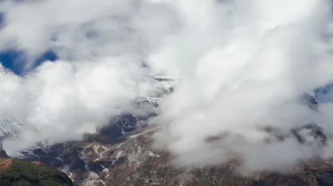 Time-lapse of clouds moving around Himalayan mountains. Cropped. Stock Footage 50526594