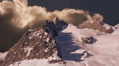 Time lapse of clouds moving behind mountain panorama Stock Footage 37134405