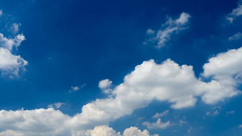 Time lapse of clouds moving in a clear blue sky Stock Footage 95307862