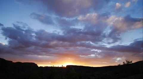Time lapse Clouds moving during a beautiful sunset. Stock Footage 55495943