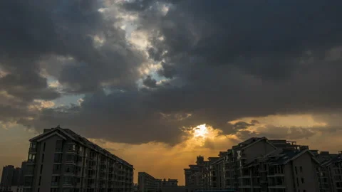 Time Lapse of Clouds Moving During a Sunset Stock Footage 165577640
