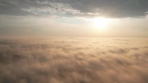 Time-Lapse Of Clouds Moving During Sunset above the clouds Video stock 243626572