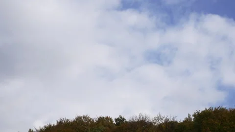 Time Lapse of clouds moving fast cinematic sky background. 4K Video stock 229892653