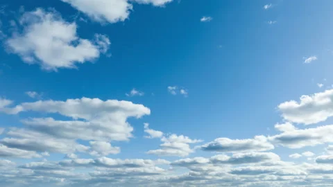 Time-lapse of clouds moving on a mostly sunny day Stock Footage 172499839