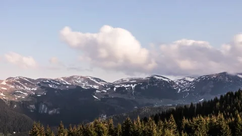 Time lapse of clouds moving in mountains environment Stock Footage 241744209