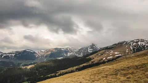 Time lapse of clouds moving in mountains environment Stock Footage 241744213