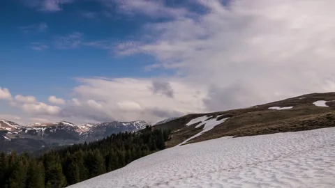 Time lapse of clouds moving in mountains environment Stock Footage 241745147