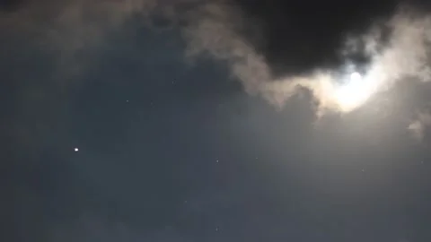 Time-lapse of clouds moving in night sky. Stock Footage 136441075