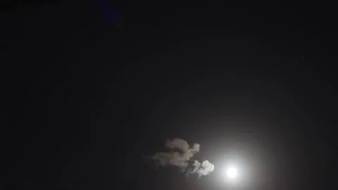 Time-lapse of clouds moving in night sky. Thick clouds cover moon. Moon time Stock Footage 138540747