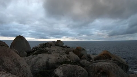 Time lapse of clouds moving in from the ocean 動画素材 127497988