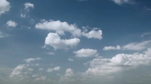 Time lapse  clouds moving over blue sky Stock Footage 11024956