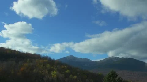 Time Lapse of Clouds Moving Over Mountains Stock Footage 12320425