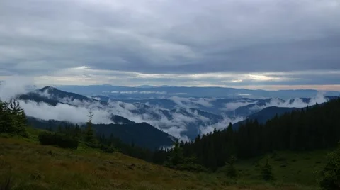 Time Lapse Clouds Moving Over Pine Tree Highland Forest. Stock-Footage 61258173