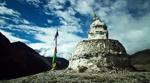 Time lapse of clouds moving over stupa Stock Footage 62389095