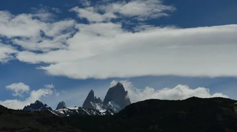 Time lapse of clouds moving over jagged mountain peaks in Patagonia Stock Footage 63278813