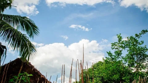 Time Lapse: Clouds moving over a fisher hut in Northern Madagascar 動画素材 70350512