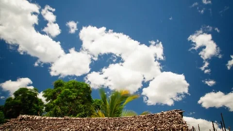 Time Lapse: Clouds moving over a fisher hut in Northern Madagascar 動画素材 70380465