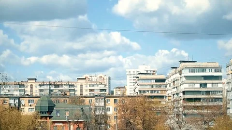 Time lapse of clouds moving over city Stock Footage 74492962