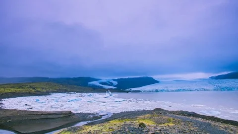 Time Lapse - Clouds Moving over the Glacier with Panning View Stock Footage 74949689