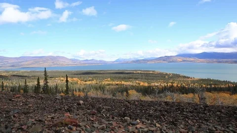 Time lapse of clouds moving over Dezadeash lake Stock Footage