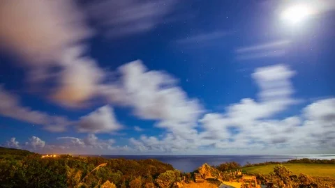 Time Lapse - Clouds Moving Over Ocean Horizon at Night with Moonlight Stock Footage 76917911