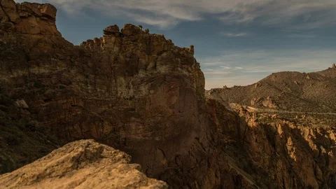 Time-lapse of clouds moving over the rocky region Stock Footage 87478298
