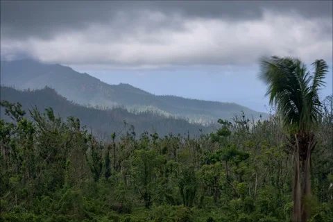 Time lapse of clouds moving over mountain range Stockbeeldmateriaal 91125880