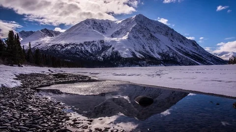 Time lapse of clouds moving over King's Throne Mountain in Kluane National Park Stock Footage 94838062