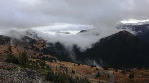 A Time-Lapse of Clouds Moving in over a valley from_Hart's Pass WA_1080P Stock Footage 100566834