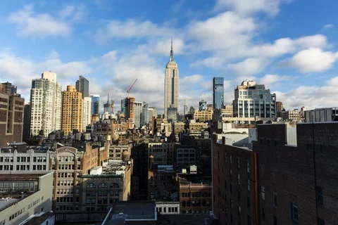 Time-lapse of clouds moving over the skyscrapers in New York Stock Footage 105412112