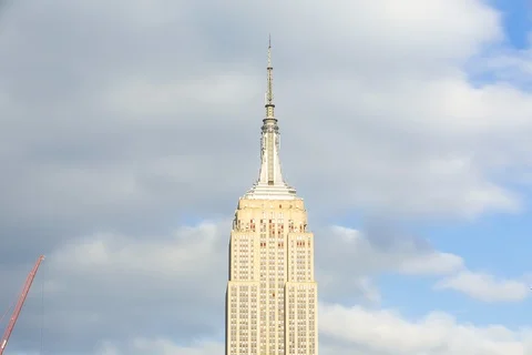 Time-lapse of clouds moving over the Empire State Building in New York Stock Footage 105413343