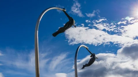 Time Lapse of Clouds Moving Over an Art Installation In Puerto Natales Stock Footage 105620664