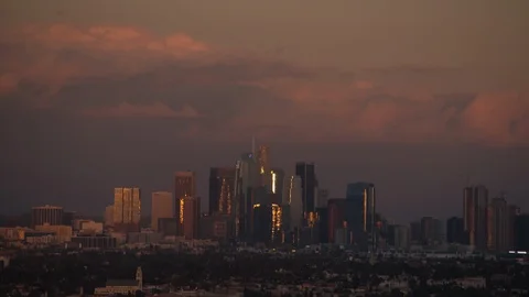 Time-lapse of clouds moving over skyline in the Los Angeles city at dusk Stock Footage 116600704