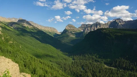 Time Lapse of Clouds Moving Over the Valley in Glacier National Park Stock Footage 121985238