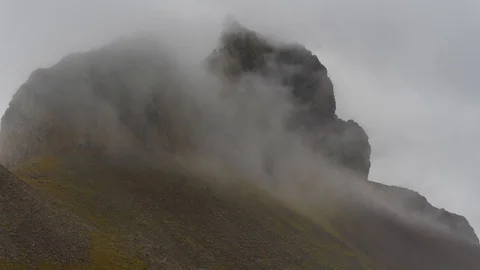 Time Lapse of Clouds Moving Over a Mountain Stock Footage 126221293