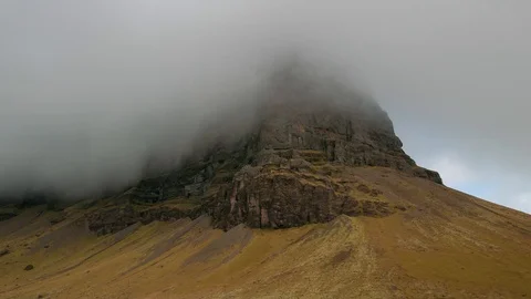 Time Lapse of Clouds Moving Over a Mountain Stock Footage 126221347