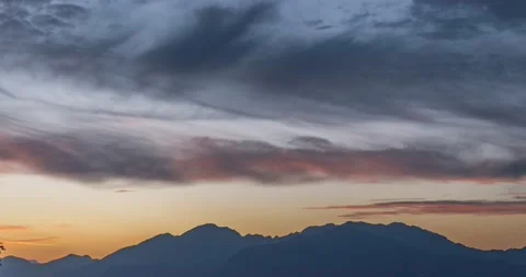 Time lapse clouds moving over Alps mountain range Stock Footage 135404168